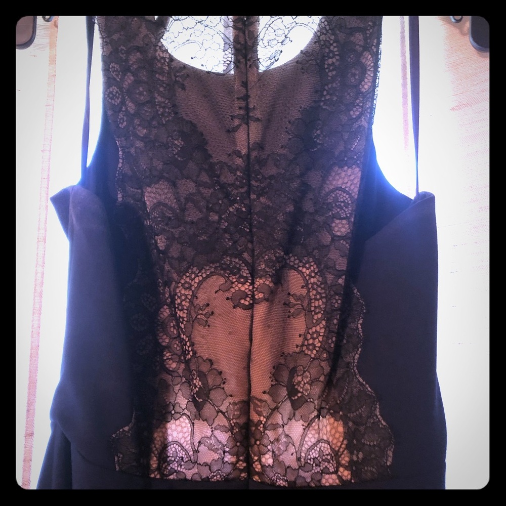 Back detail, front slit, peekaboo floorlength gown